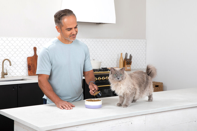 pet model and full body model on a beige backdrop